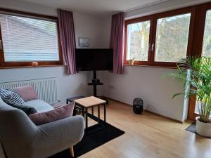 Posezení v ubytování Ferienwohnung Am Wald