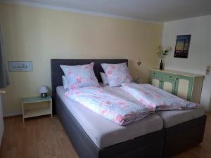 Postel nebo postele na pokoji v ubytování Ferienwohnung Am Wald