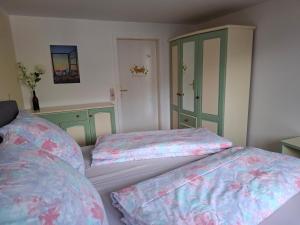 Postel nebo postele na pokoji v ubytování Ferienwohnung Am Wald