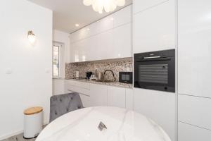 Kuchyň nebo kuchyňský kout v ubytování Apartment Miramar - Seaview self check-in