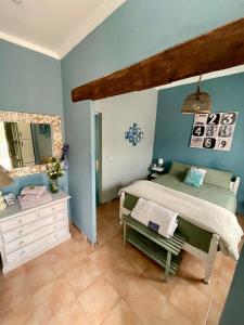 Postel nebo postele na pokoji v ubytování Casa Rural Ubeda - B&B - Pinoso-Alicante
