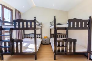Postel nebo postele na pokoji v ubytování Gu'an County Qiaofei Homestay