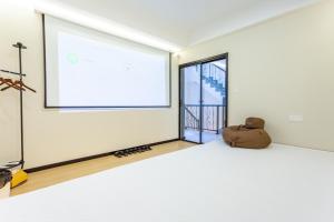 Postel nebo postele na pokoji v ubytování Gu'an County Qiaofei Homestay