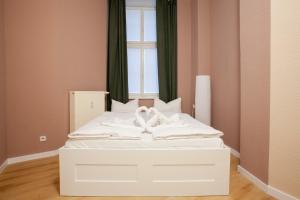 Katil atau katil-katil dalam bilik di Atelier Rosé +7 gambar