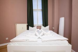 Katil atau katil-katil dalam bilik di Atelier Rosé