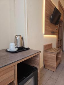 Kuchyň nebo kuchyňský kout v ubytování Hotel Romano