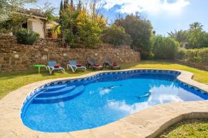 Bazén v ubytovaní Casitas Select - Villa Abajo in Mijas alebo v jeho blízkosti