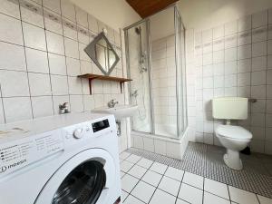 Koupelna v ubytování Helles Apartmenthaus für Handwerker und Monteuere - HM