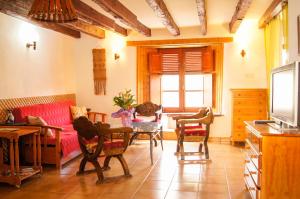 A television and/or entertainment centre at Finca Patio Canario