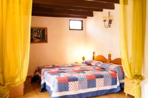 A bed or beds in a room at Finca Patio Canario