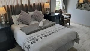 Ένα ή περισσότερα κρεβάτια σε δωμάτιο στο Bella Vista Guest House +37 φωτογραφίες
