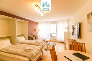 Postel nebo postele na pokoji v ubytování Lorez 5A by Arosa Holiday
