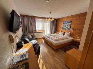 Μια τηλεόραση ή/και κέντρο ψυχαγωγίας στο Appartement Pension St. Sebastian