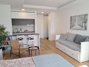 Posezení v ubytování Manhattan studio A blok
