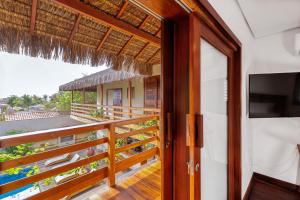 TV/trung tâm giải trí tại Deluxe Villa Luz Do Mar - Suites Privativas