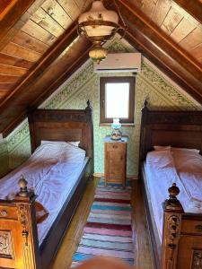 Una cama o camas en una habitación de Pansion Sašin Salaš 40m2