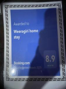 Certifikát, hodnocení, plakát nebo jiný dokument vystavený v ubytování Weeragiri home stay
