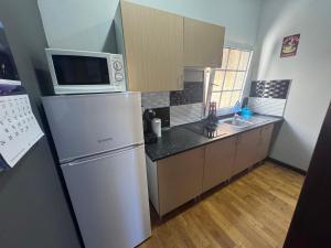Kuchyň nebo kuchyňský kout v ubytování Guest House Casa Tacoronte