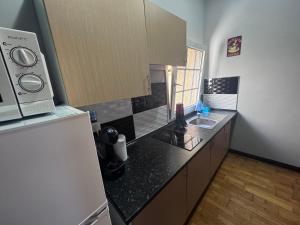 Kuchyň nebo kuchyňský kout v ubytování Guest House Casa Tacoronte
