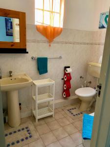 Koupelna v ubytování La Preneuse sur Mer Appartement + 8 fotografií