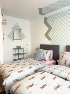 Ένα ή περισσότερα κρεβάτια σε δωμάτιο στο Rivington View Apartment