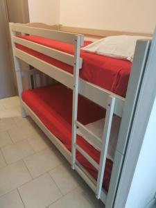 En eller flere senge i et værelse på Studio Port Cap d'Agde CAP3