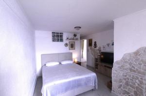 Posteľ alebo postele v izbe v ubytovaní Lovely Apartment ES