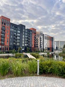 a city with tall buildings and a body of water at Bridgewater Studio Century City in Century City