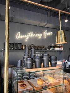 a sign that says anything good on a wall in a bakery at Bridgewater Studio Century City in Century City