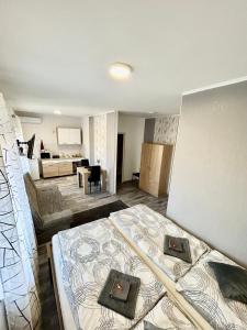 Postel nebo postele na pokoji v ubytování Mira Nest - Budapest City