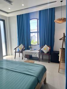 Ένα ή περισσότερα κρεβάτια σε δωμάτιο στο Homestay Minh Hà