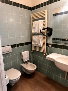 Koupelna v ubytování Confidence Hotel Parma