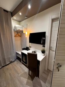 TV a/nebo společenská místnost v ubytování Confidence Hotel Parma + 9 fotografií