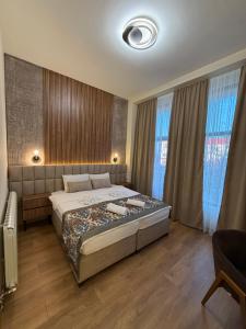 Letto o letti in una camera di Apostolovic Plus