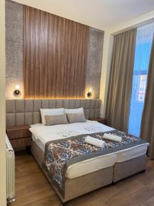 Letto o letti in una camera di Apostolovic Plus