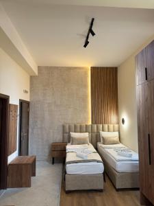 Letto o letti in una camera di Apostolovic Plus