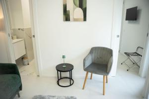 Televiisor ja/või meelelahutuskeskus majutusasutuses Emme Suites +7 fotot