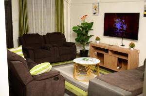 TV a/nebo společenská místnost v ubytování Lyon's Place