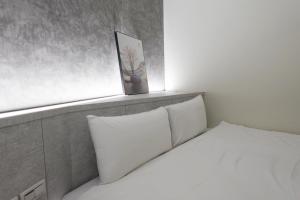 Voodi või voodid majutusasutuse hōo落雨 溫泉旅店 toas