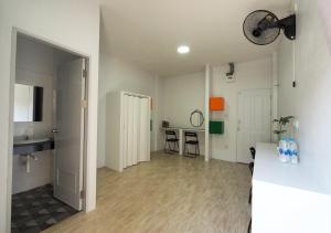 Kuchyň nebo kuchyňský kout v ubytování Prukpibul Apartment + 14 fotografií