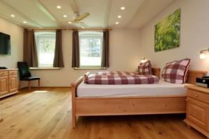 Ein Bett oder Betten in einem Zimmer der Unterkunft Ferienhaus Lotus Hof Stallegg