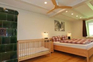 Ein Bett oder Betten in einem Zimmer der Unterkunft Ferienhaus Lotus Hof Stallegg