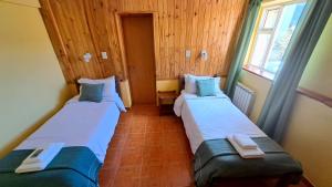 Postel nebo postele na pokoji v ubytování Hosteria LOS ÑIRES + 73 fotografií