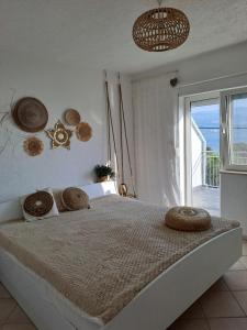 Posteľ alebo postele v izbe v ubytovaní Vakantiehuis Ciovo