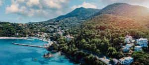 an aerial view of a town on a mountain at Alkyoni Apartments & Studios in Poros