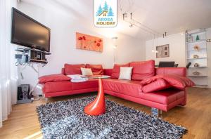 TV a/nebo společenská místnost v ubytování Rothornblick 04 by Arosa Holiday