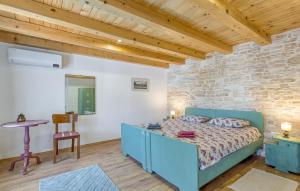 Ένα ή περισσότερα κρεβάτια σε δωμάτιο στο 3 Bedroom Beautiful Home In Kanfanar