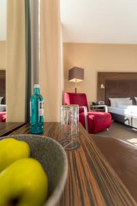 Postel nebo postele na pokoji v ubytování Herzogshof - Boutique-Hotel am Dom