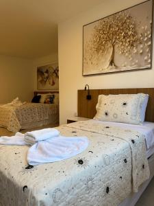 Postel nebo postele na pokoji v ubytování Hotel Formosa - Posto da Mata