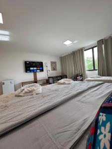 Postel nebo postele na pokoji v ubytování Hotel Formosa - Posto da Mata